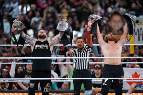 Owens and Zayn end the Usos historic title reign