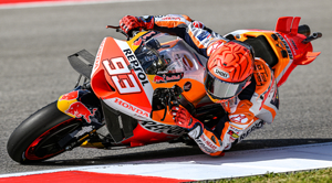 Marquez storms to pole at Portuguese GP with lap record